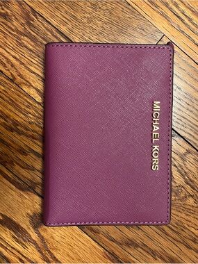 Michael Kors Plum Saffiano Passport Holder with Gold Logo